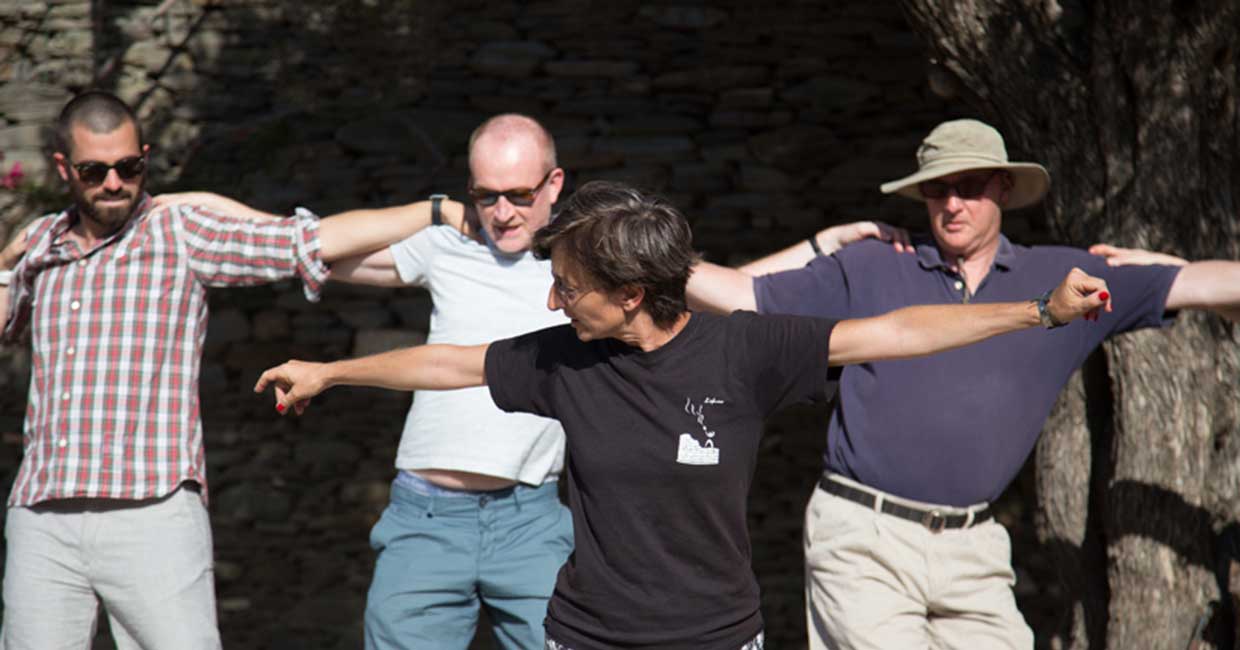 Learning greek traditional dances with your friends as part of vacations in Sifnos